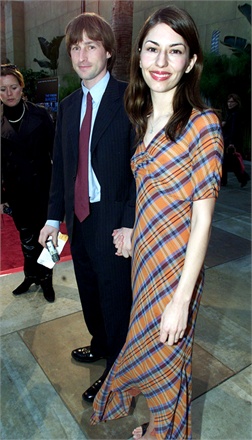HOLLYWOOD, : US film director Sofia Coppola (R) arrives at the premiere of her first feature film "The Virgin Suicides" with her husband film director Spike Jonze (L) in Hollywood, 18 April 2000. Sophia's father, film director Francis Ford Coppola, produced the film which stars James Woods, Kirsten Dunst and Danny De Vito. (ELECTRONIC IMAGE) AFP PHOTO/Lucy NICHOLSON (Photo credit should read LUCY NICHOLSON/AFP/Getty Images)
