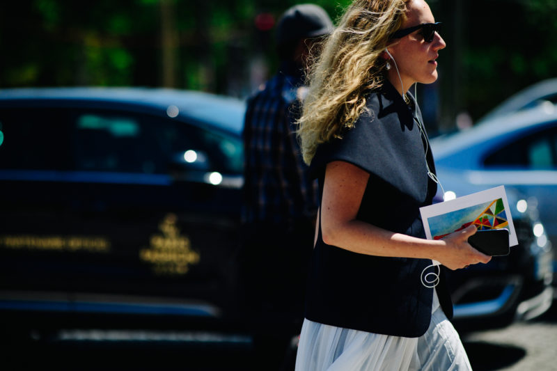 Woman wearing glasses and black top